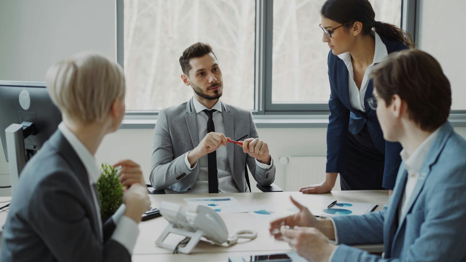 Professionals meeting around a conference table